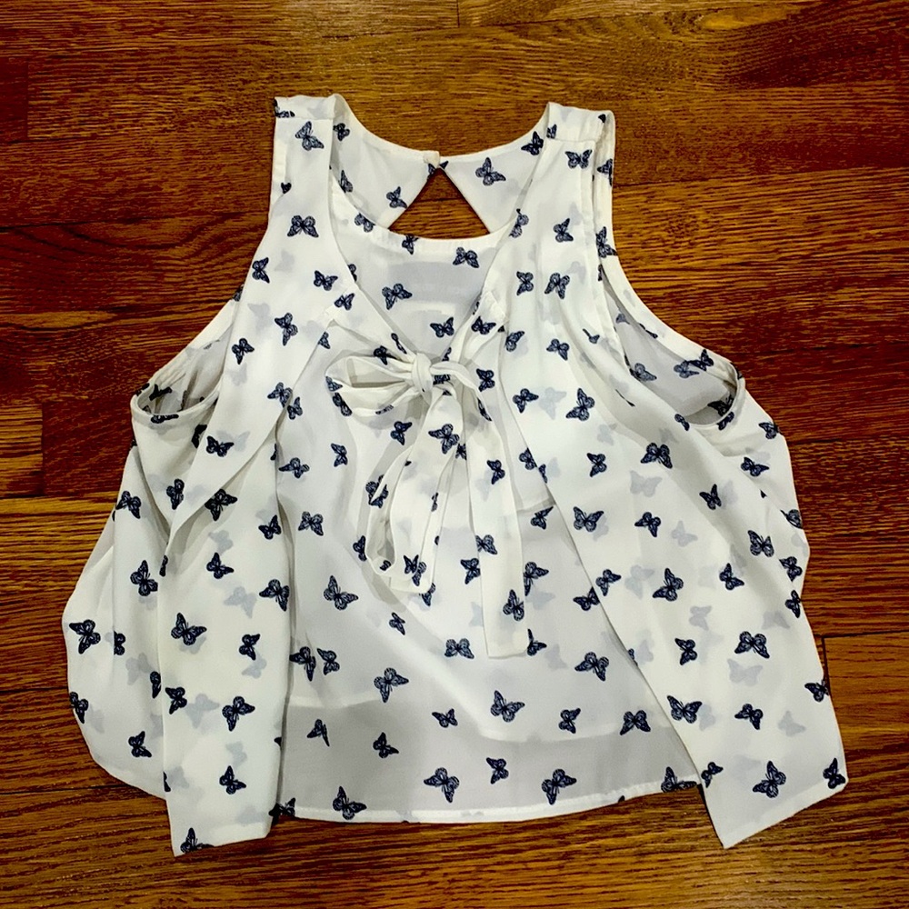 Adorable white top with blue butterflies